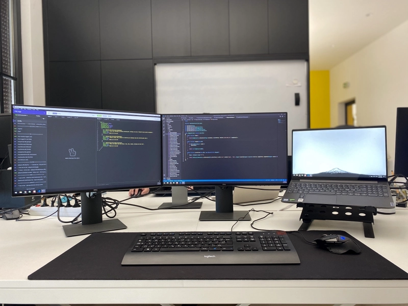 Dennis Lefa Halo - Freelance Web Developer and Local SEO Specialist working at desk in Pretoria